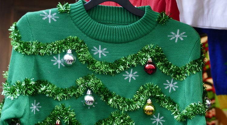 Pull de noel super heros 2025